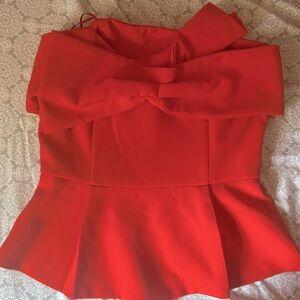 Strapless red peplum blouse with bow